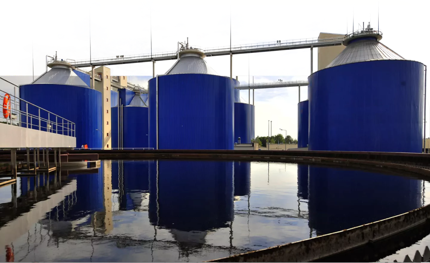Blue storage tanks at water treatment plant